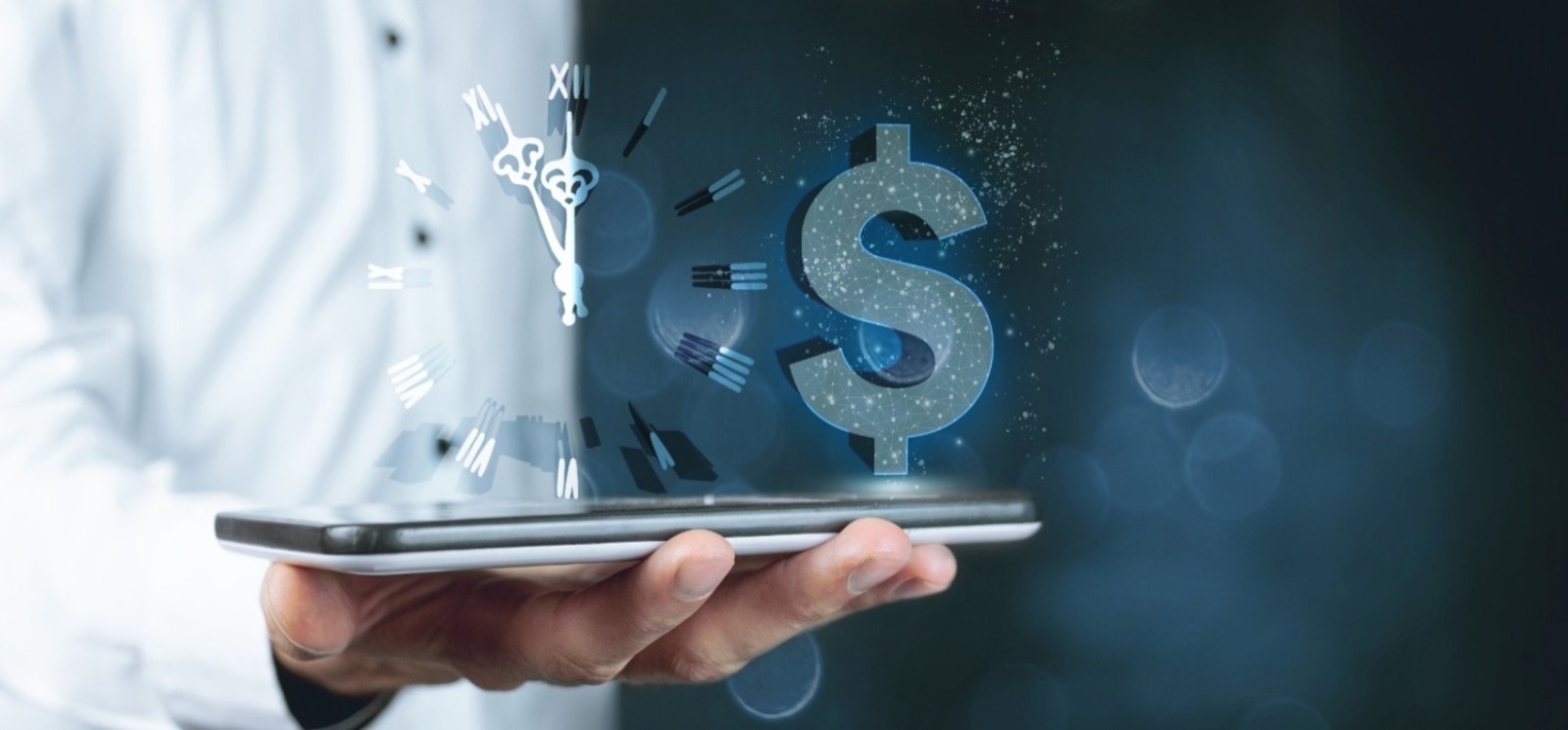 hand holding a laptop with an image of a clock and a dollar sign above it