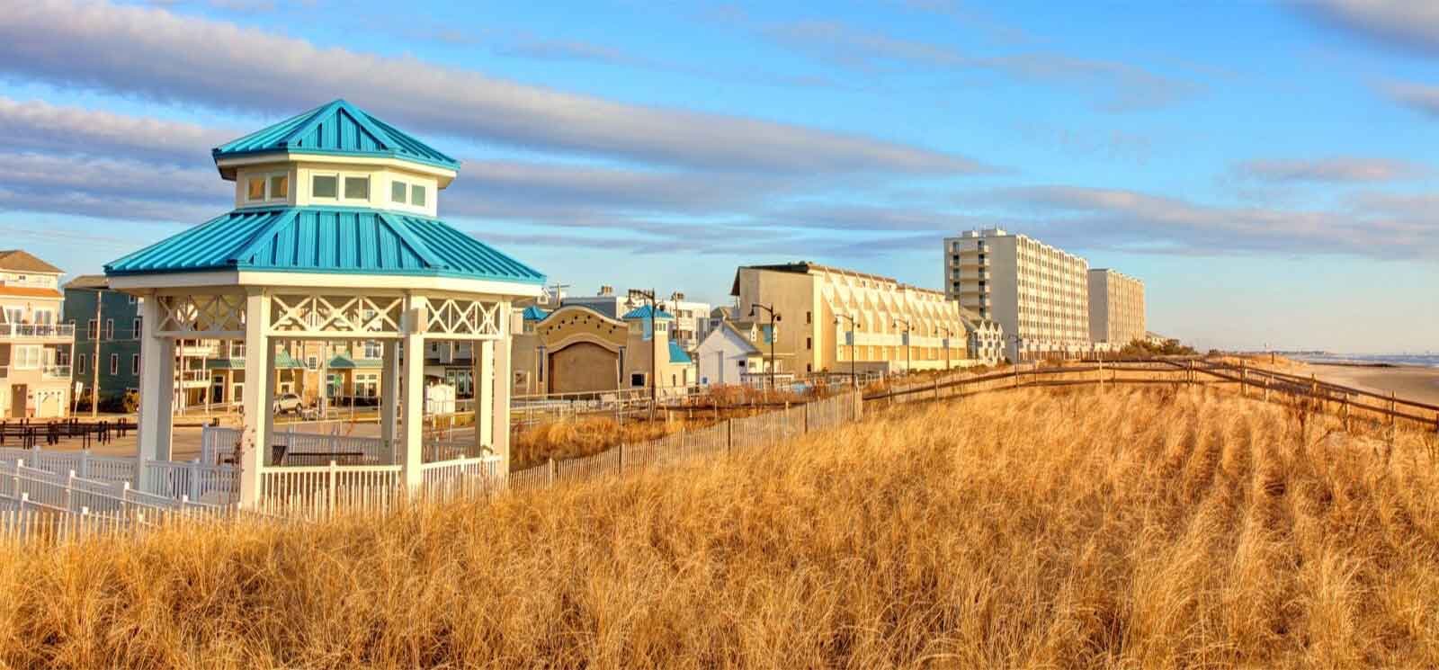 landscape of a grassy beach and gazebo